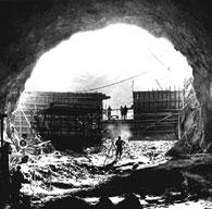 One of the tunnels dug to send river water around the construction area