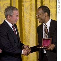 Doctor Carson receives the Presidential Medal of Freedom from George W. Bush last year