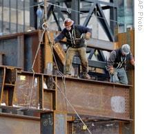 Better times: Workers build a Manhattan high-rise in 2006. Now, lending has tightened in the commercial real estate market.  