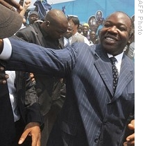 Ali Bongo greets supporters in Libreville after being declared winner of bitter presidential election in Gabon, 03 Sep 2009