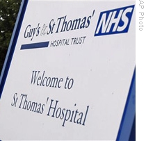 A sign seen, at the entrance to St Thomas' Hospital, part of the National Health Service, in London, 14 Aug 2009