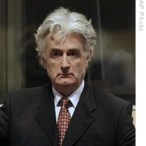 Bosnian Serb leader Radovan Karadzic is seen in the courtroom to enter pleas to 11 charges including genocide and crimes against humanity, in the Hague, Netherlands (File)<br /> 