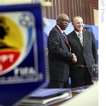 FIFA Vice-president Jack A. Warner, right, and LOC Chairman and FIFA Executive Committee member Hany Abou Rida, in Cairo, Egypt, 23 Sep 2009