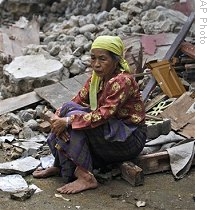 Indonesian Tsunami Survivors Arrive to Help Earthquake Victims