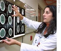 A doctor looks at a CT brain scan at Children's National Medical Center in Washington