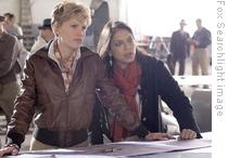 Mira Nair, right, on the set of the movie with Hillary Swank