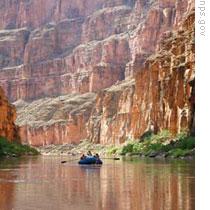 Visitors can travel down the Colorado River by boat in the Grand Canyon