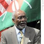 US Assistant Secretary for African Affairs Johnnie Carson talks to the media as he stands infront of the US and Kenyan flags at US ambassador's residence in Nairobi, Kenya, 26 Oct 2009