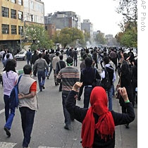 Photo obtained by AP outside Iran shows anti-government protestors in Tehran, 04 Nov 2009