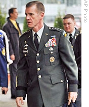 A 23 Oct 2009 file photo of Gen. Stanley McChrystal, top US and NATO commander in Afghanistan (R), arriving to NATO defense ministers' meeting in Bratislava, Slovakia