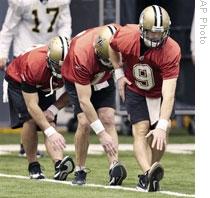 Members of the New Orleans Saints football team doing exercises Thursday in Louisiana