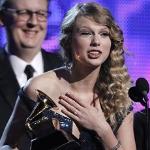 Taylor Swift accepts the Album of the Year award at the Grammy Awards in Los Angeles, 31 Jan. 2010
