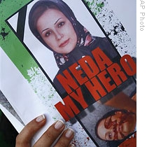 An Iranian protestor holds a picture of Neda Agha Soltan, a woman who was killed during demonstrations against Iran's presidential election in June