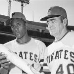 Pittsburgh Pirates' Roberto Clemente, left, talks with manager Danny Murtaugh.