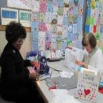 Local quilters volunteered to sew thousands of patches together into a huge quilt.