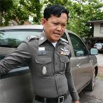 Red shirt police officer Sakda Muthasin outside the Ban Pheu police stattion, 17 May 2010
