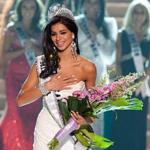 This handout photo shows Rima Fakih, 24, of Dearborn, Michigan, as she reacts after being crowned Miss USA 2010, 16 May 2010