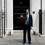 Britain Makes Huge Cuts to Avert Debt Crisis
