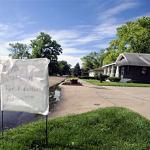 A home-made sign urges residents to vote yes on a proposed municipal ordinance that would ban hiring or renting property to illegal immigrants in the city of Fremont, Nebraska, 21 Jun 2010