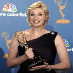 Actress Jane Lynch poses in press room with award for outstanding supporting actress in a comedy series for her work on 
