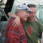 George Wein, with a fan, at the 2010 Newport Jazz Festival