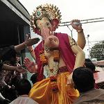 An idol of Hindu Lord Ganesh is placed into a passenger train as it is transported from a workshop in Mumbai, India, 05 Sept. 2010