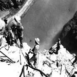 High scalers drill into the canyon wall 500 feet above the Colorado River