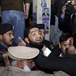 The alleged killer of Governor of Punjab, Salman Taseer, being brought to a court in Islamabad, Pakistan, 05 Jan 2011.
