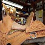 Nancy Martiny builds her saddles from the ground up, eventually carving and stamping intricate patterns into the leather. 