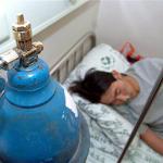 A patient poisoned by carbon monoxide receives treatment at a hospital in China's Jilin province in 2006