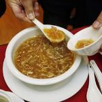 A bowl of shark fin soup being served at a restaurant in San Francisco's Chinatown area