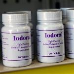 Bottles of potassium iodide sit on the shelf of the Texas Star Pharmacy in Plano, Texas, March 15, 2011