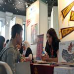 A recruiter answers questions from an Indonesian student looking to study in the US, at a US education fair sponsored by the US Embassy in Jakarta, April 4, 2011