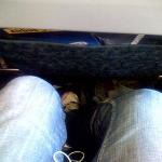 My, but this row offers a lot of legroom.  Plenty of room next to you if you get the middle seat, too, no doubt. 