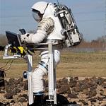 An astronaut tests a Mark III space suit designed for the Constellation program in 2007