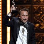 Norbert Leo Butz accepts the Tony Award for Best Performance by an Actor in a Leading Role in a Musical for "Catch Me If You Can" during the 65th annual Tony Awards, Sunday, June 12, 2011 in New York. 